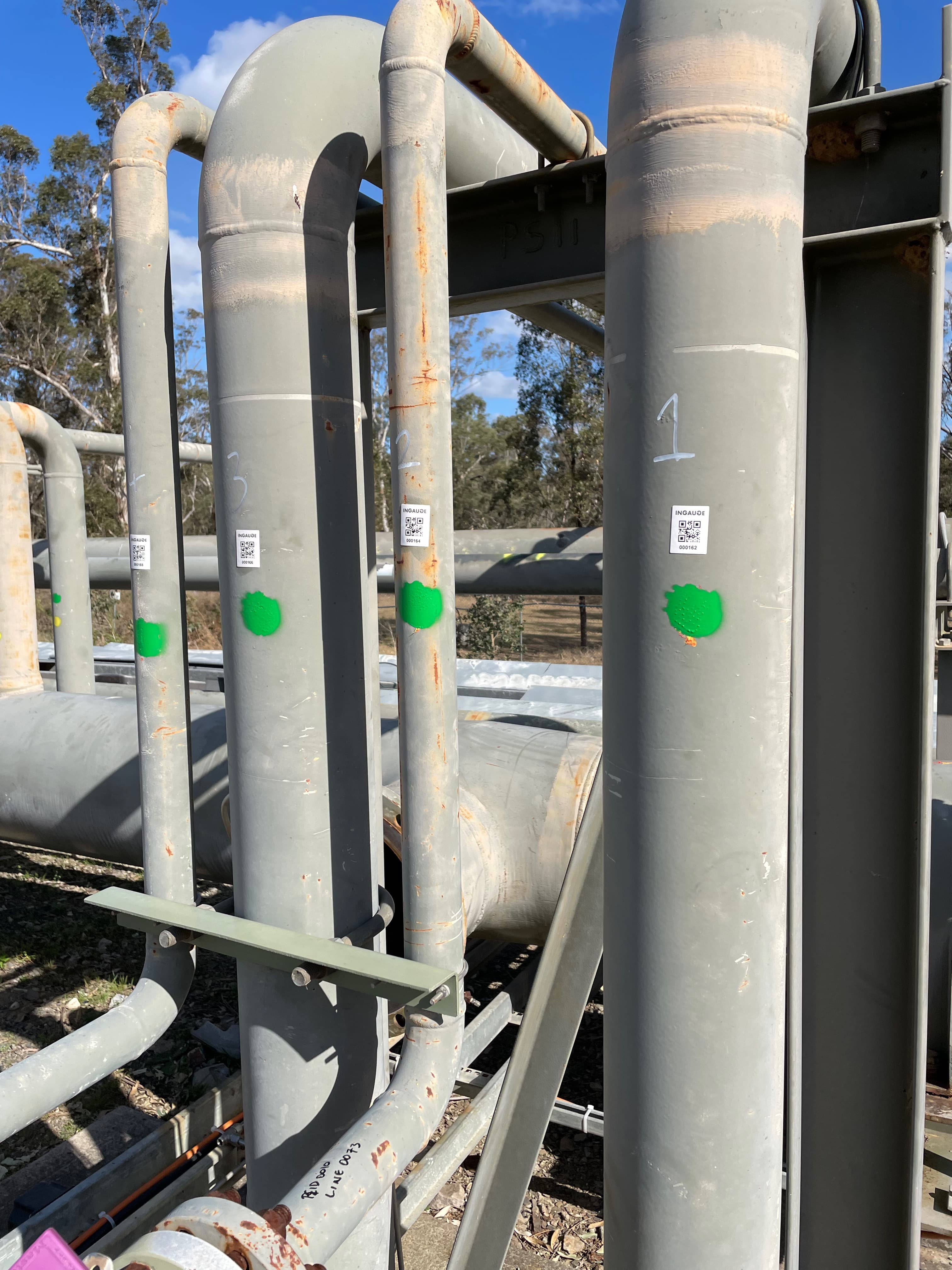 A second example of a QR code sticker on a piece of equipment.